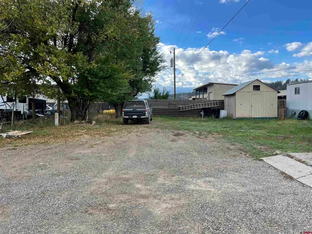 a view of a house with a garden