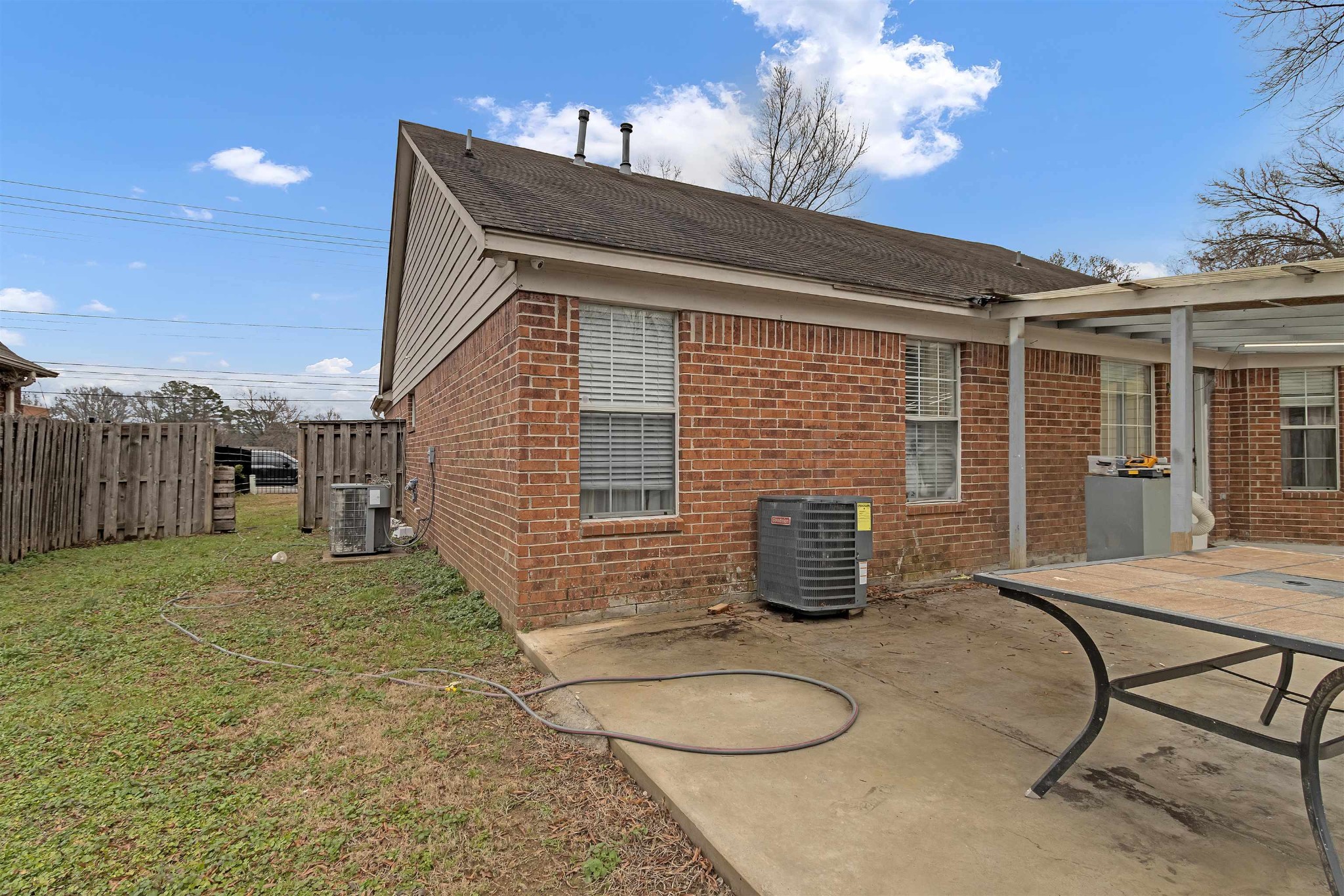 755 North Perkins Road Memphis, TN 38122 - Photo 25 of 25 a backyard of a house with table and chairs