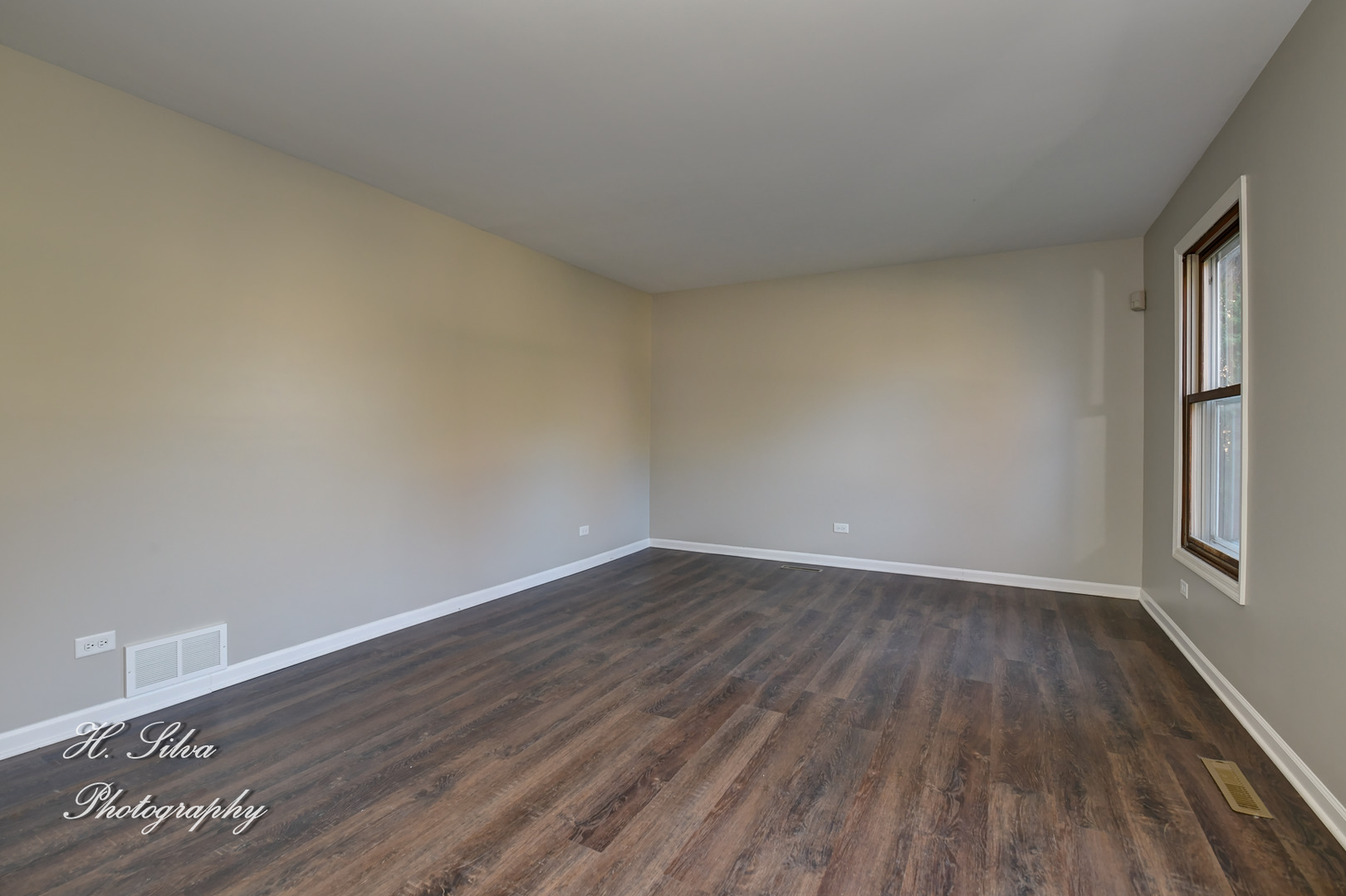 331 Cornell Lane Algonquin, IL 60102 - Photo 3 of 30 a view of an empty room and wooden floor