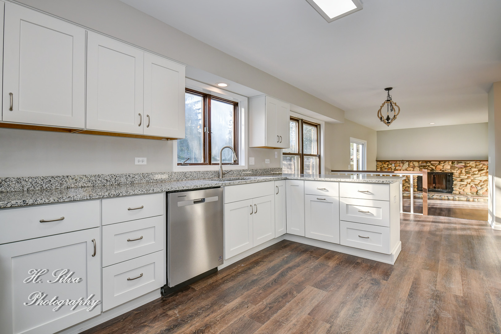 331 Cornell Lane Algonquin, IL 60102 - Photo 9 of 30 a kitchen with granite countertop white cabinets white stainless steel appliances with a sink and dishwasher
