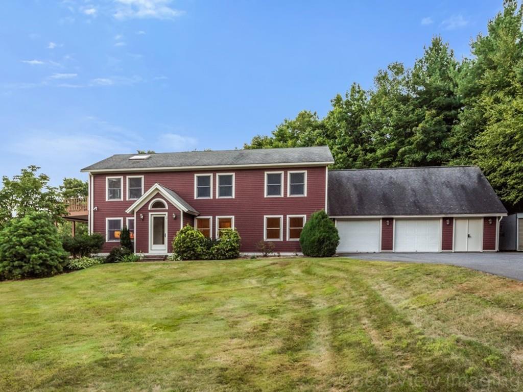 3 Ralph Road Hopkinton, MA 01748 - Photo 1 of 28 a front view of a house with a yard