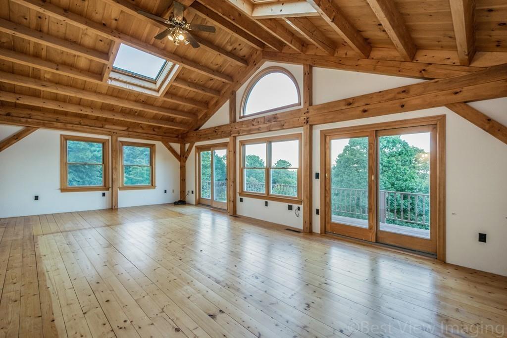 3 Ralph Road Hopkinton, MA 01748 - Photo 14 of 28 a view of empty room with wooden floor and fan