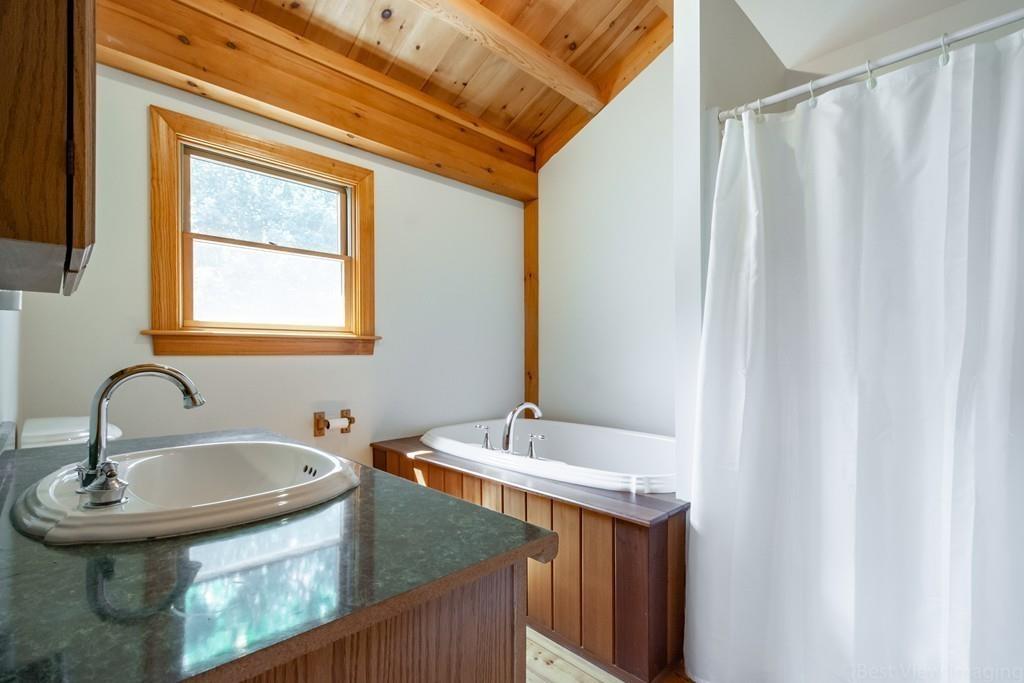 3 Ralph Road Hopkinton, MA 01748 - Photo 16 of 28 a bathroom with a sink and a mirror
