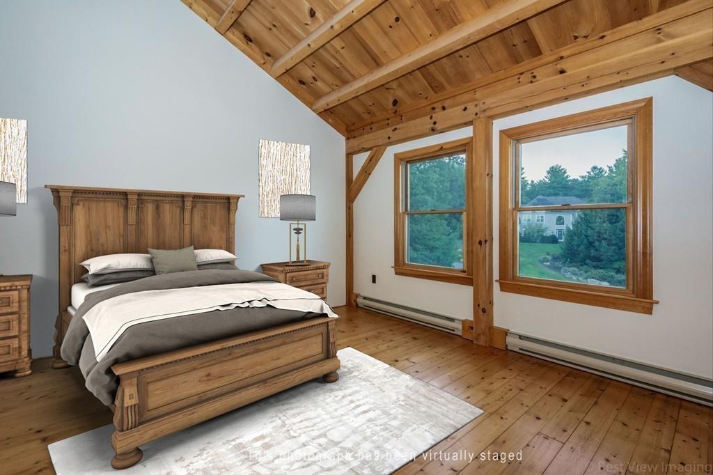 3 Ralph Road Hopkinton, MA 01748 - Photo 17 of 28 a bedroom with a bed next to a large window