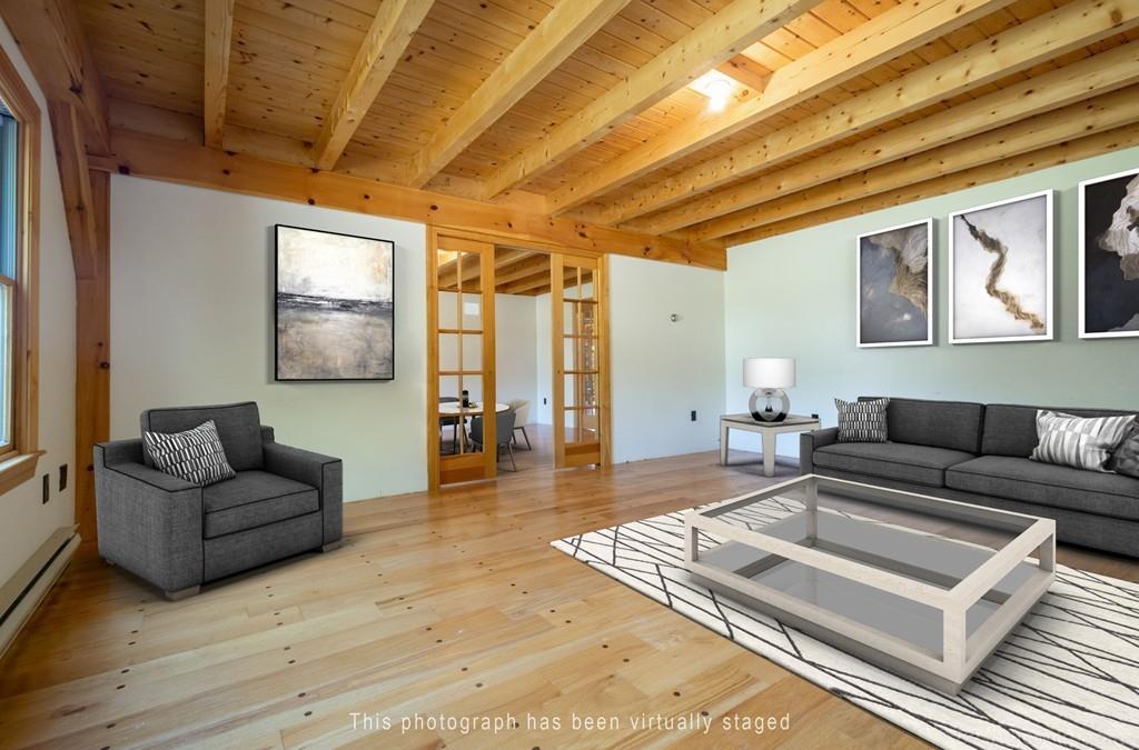 3 Ralph Road Hopkinton, MA 01748 - Photo 2 of 28 a living room with furniture and a rug