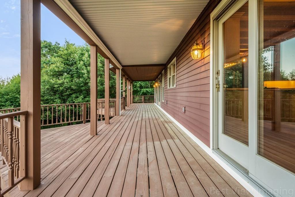 3 Ralph Road Hopkinton, MA 01748 - Photo 22 of 28 a view of balcony with wooden floor