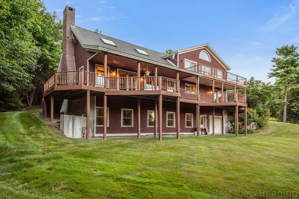 3 Ralph Road Hopkinton, MA 01748 - Photo 27 of 28 a front view of a house with garden
