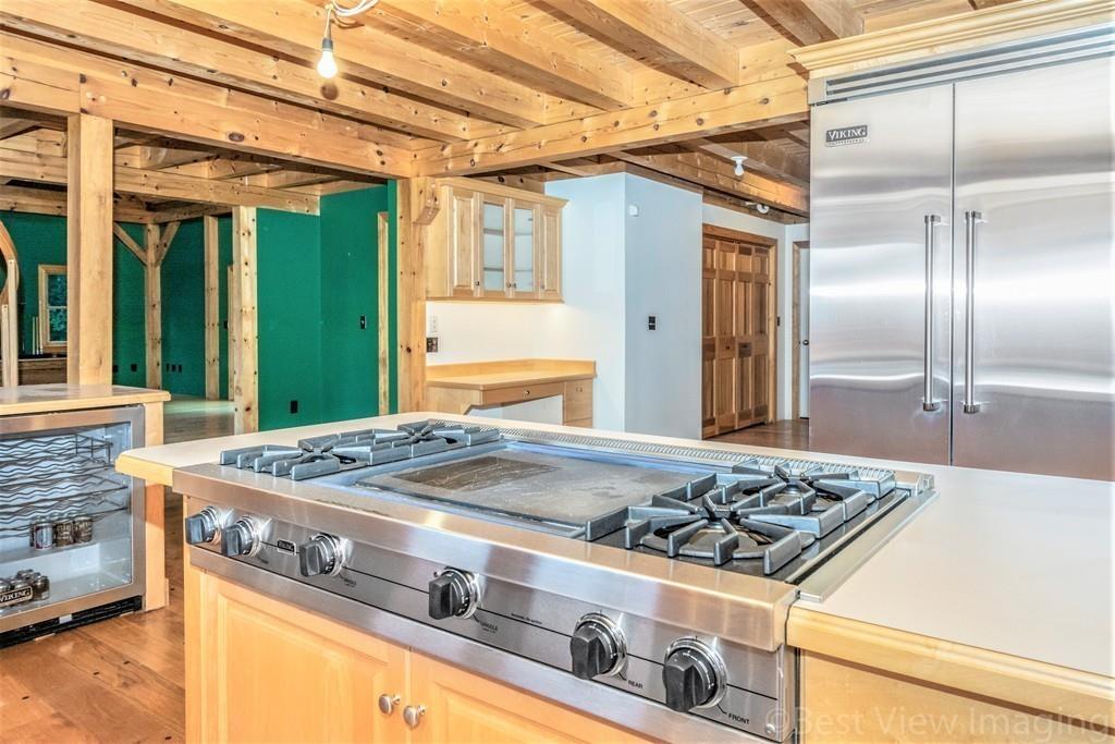 3 Ralph Road Hopkinton, MA 01748 - Photo 8 of 28 a kitchen with stainless steel appliances granite countertop a sink stove and refrigerator