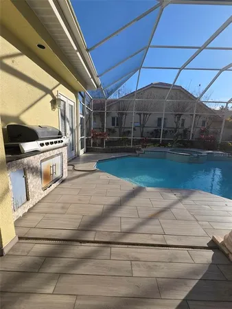 a bedroom with a bed and a fireplace