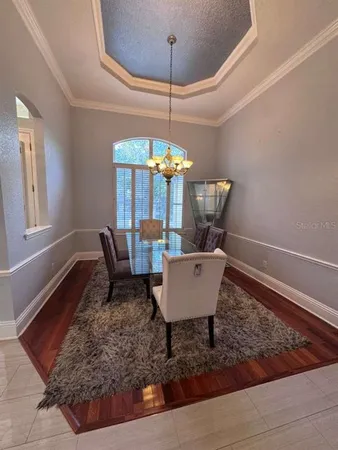 a dining room with a table or chairs and a wooden floor