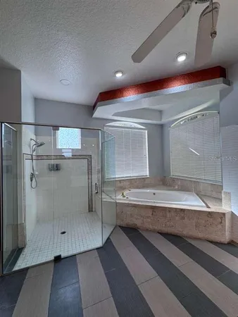 a bathroom with a double vanity sink and mirror