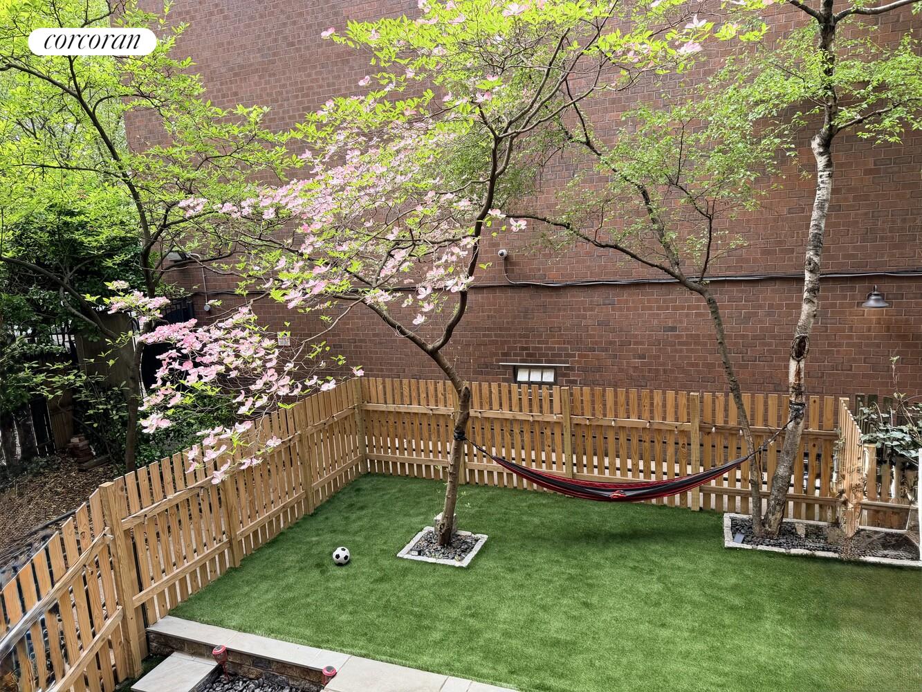 618 Washington Street, Unit GA Manhattan, NY 10014 - Photo 11 of 14 a park view with a garden