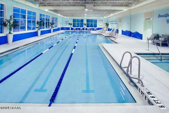 an aerial view of a swimming pool