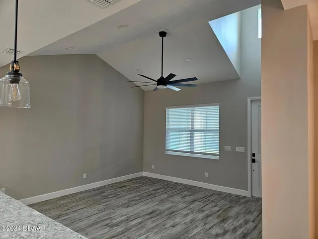a bathroom with a sink vanity and mirror