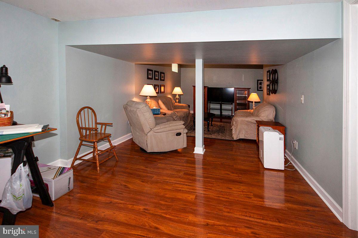 44 Aberdeen Drive Sicklerville, NJ 08081 - Photo 40 of 52 Finished Basement: (Den Area) Wood Floors