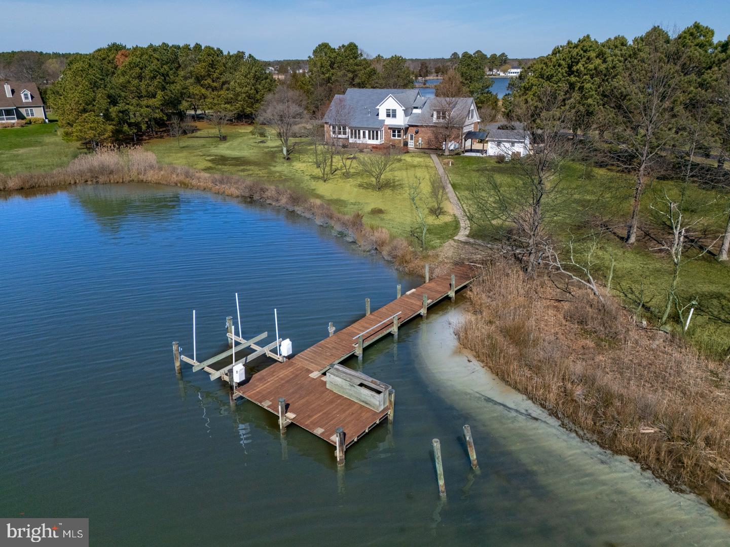 1617 Deep Water Road Woolford, MD 21677 - Photo 3 of 47 a view of a lake with a mountain in the background