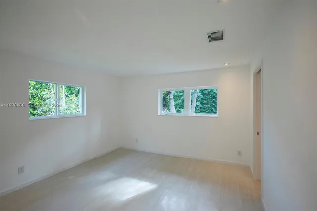 a view of a swimming pool with a outdoor seating
