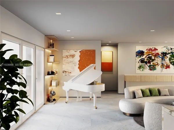 a living room with furniture gym equipment and glass doors