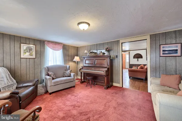 a living room with furniture and a couch