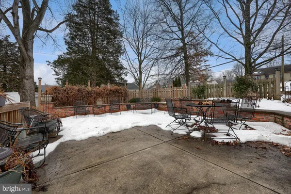 a view of a backyard of snow