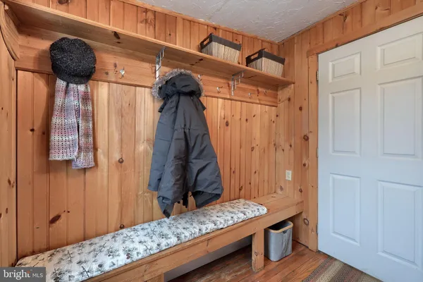 a view of wooden floor and closet