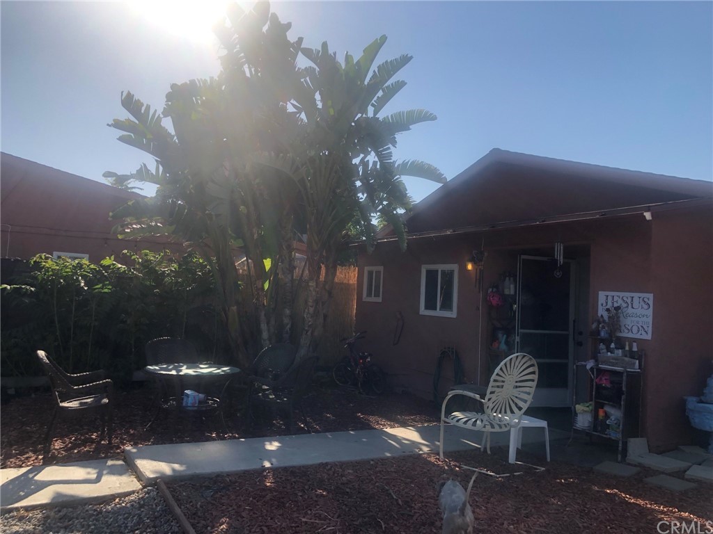 3826 Riverside Drive Chino, CA 91710 - Photo 1 of 1 a room that has a lot of flower plants