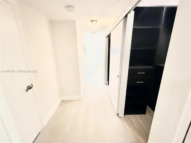a bathroom with a sink double vanity and a mirror