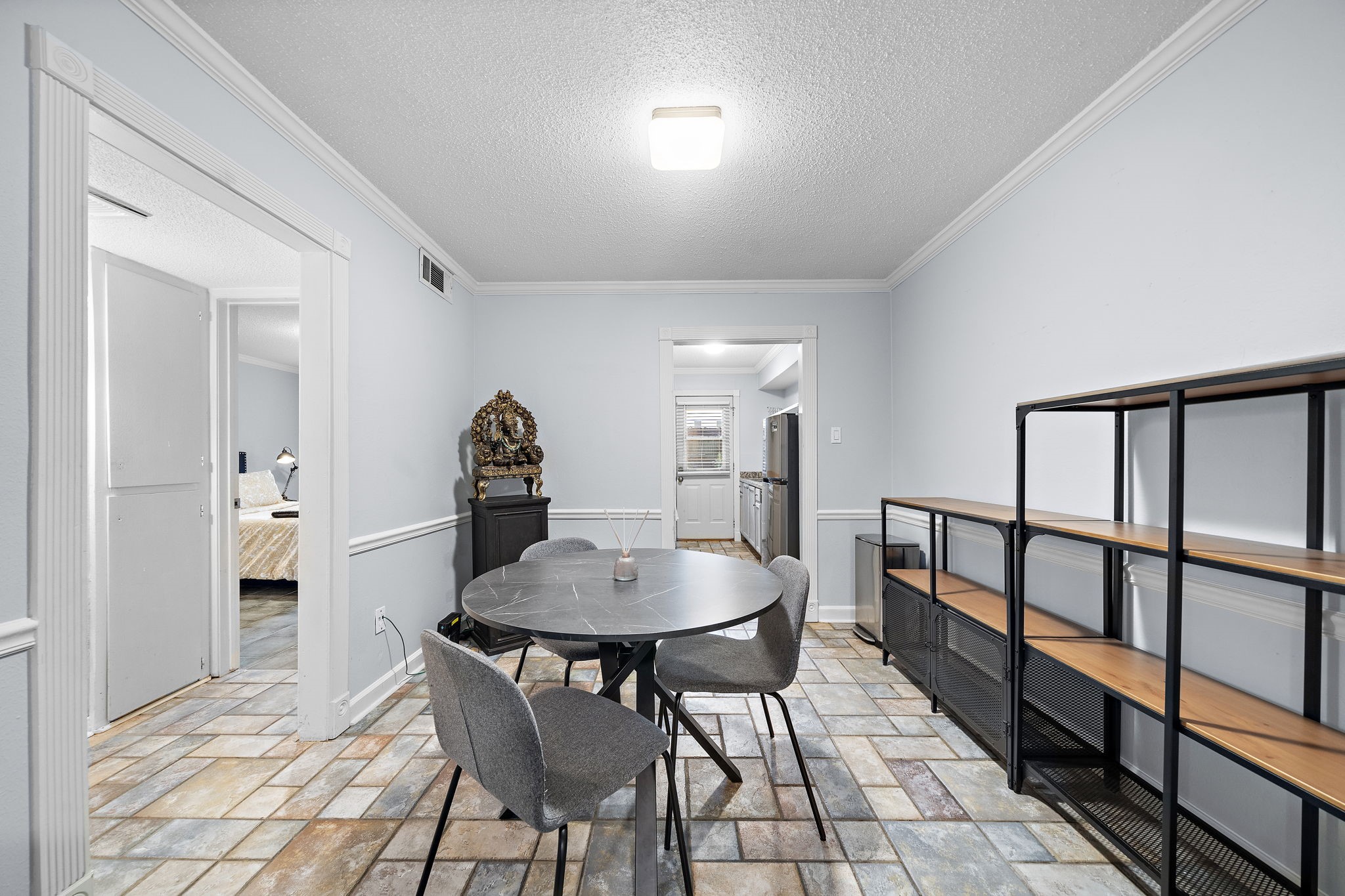 8289 Kingsbrook Road, Unit 173 Houston, TX 77024 - Photo 11 of 20 There's a dining area conveniently located just off the kitchen, ideal for enjoying meals with family and friends
