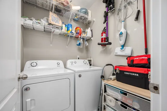 a utility room with dryer and washer