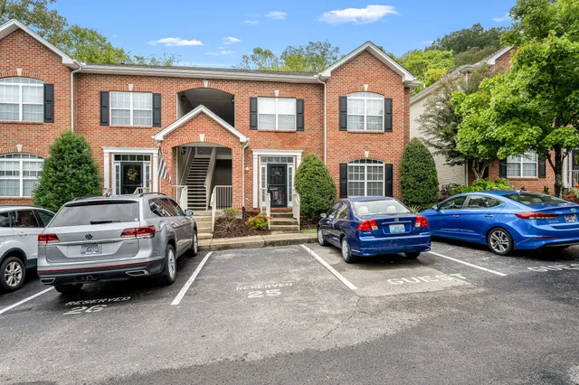 a car parked in front of a house