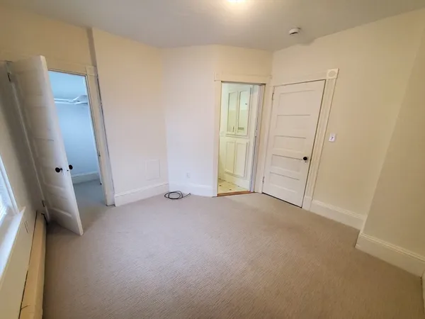an empty room with closet