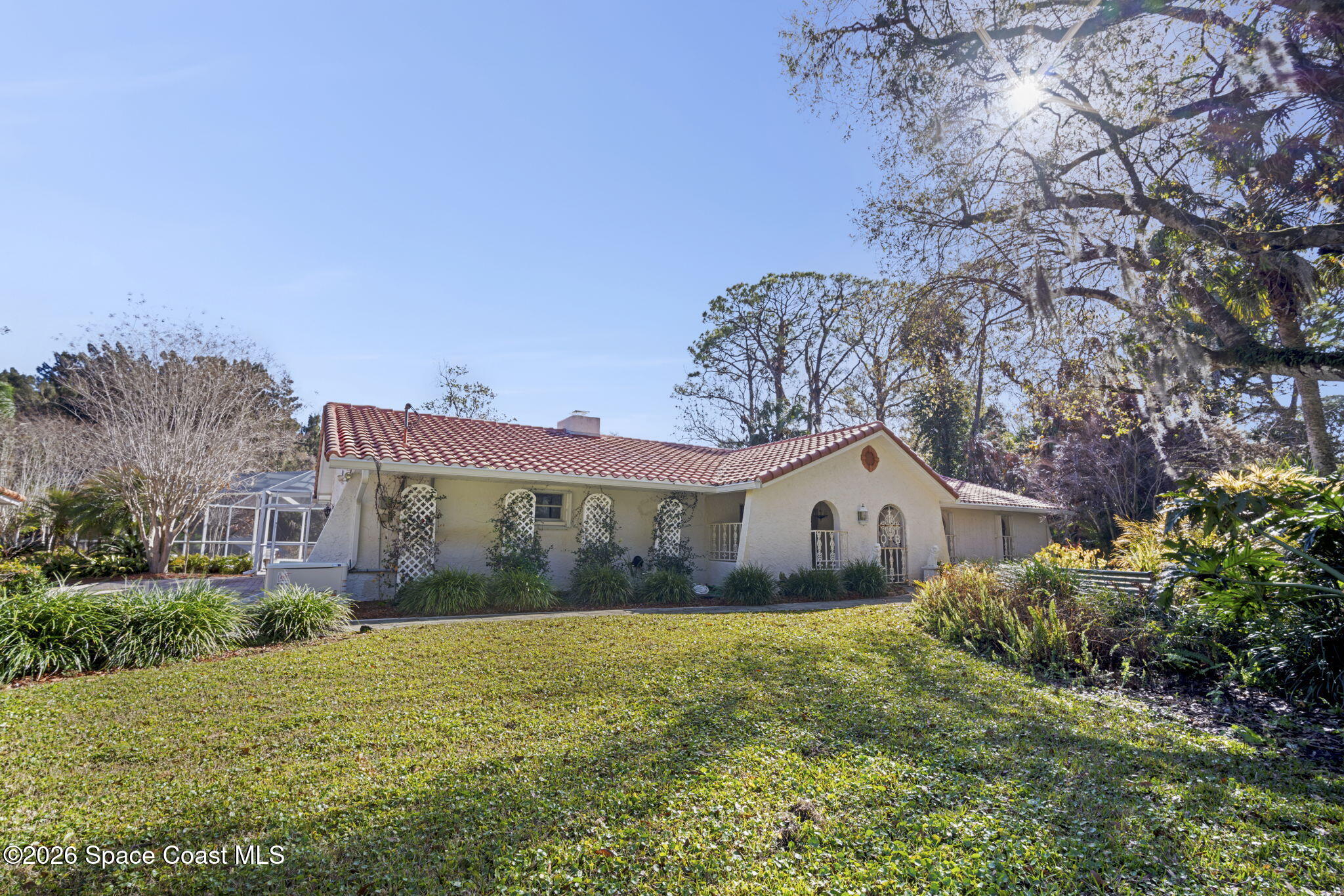 620 West Pine Road Melbourne, FL 32904 - Photo 4 of 32 a house view with a garden space