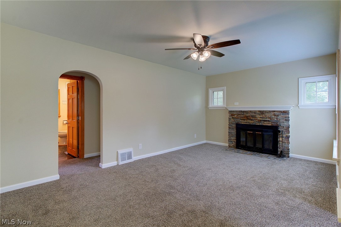 4531 12th Street Northwest Canton, OH 44708 - Photo 4 of 22 Living room with wood burning fireplace