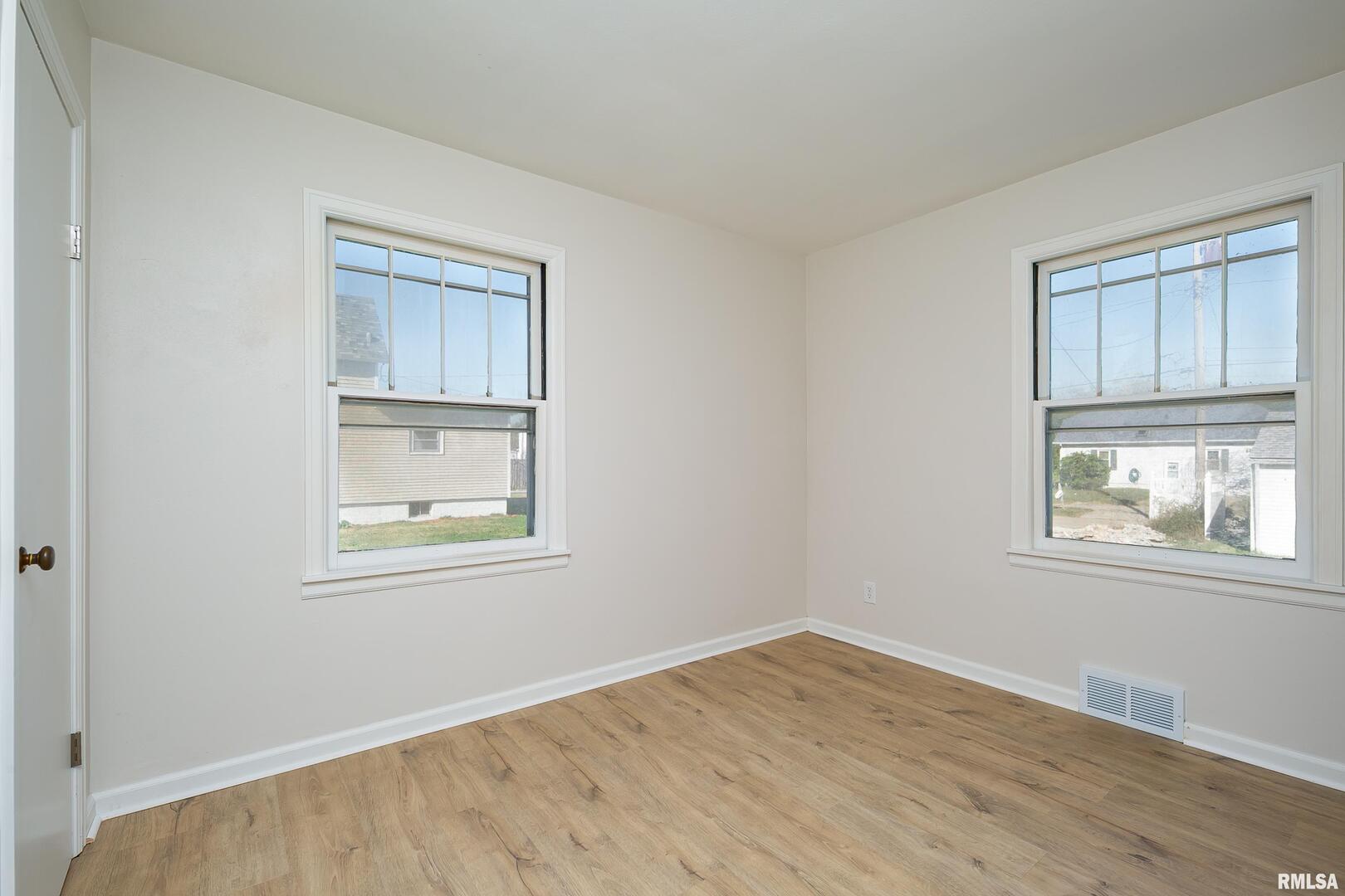 5431 3rd Avenue Moline, IL 61265 - Photo 11 of 29 an empty room with windows
