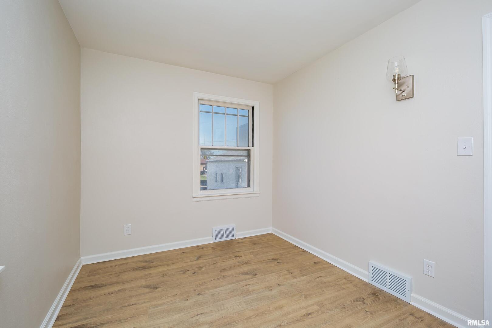 5431 3rd Avenue Moline, IL 61265 - Photo 12 of 29 a view of empty room with wooden floor