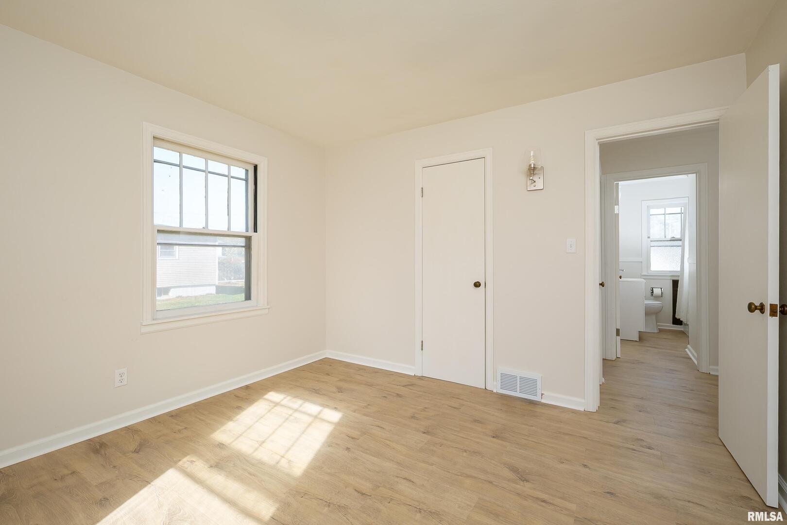 5431 3rd Avenue Moline, IL 61265 - Photo 15 of 29 a view of a room that has a bed in it