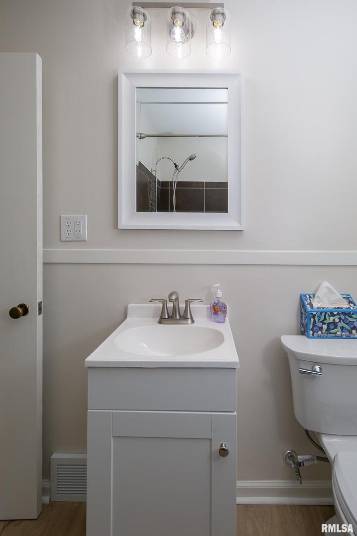 5431 3rd Avenue Moline, IL 61265 - Photo 20 of 29 a bathroom with a sink toilet and mirror