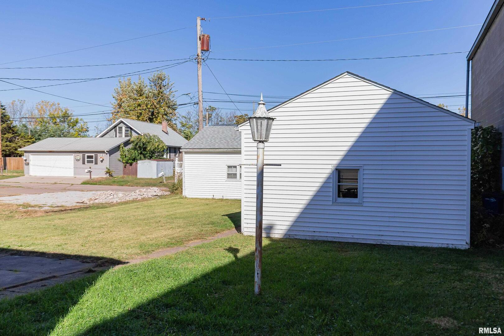 5431 3rd Avenue Moline, IL 61265 - Photo 26 of 29 a view of a house with a yard