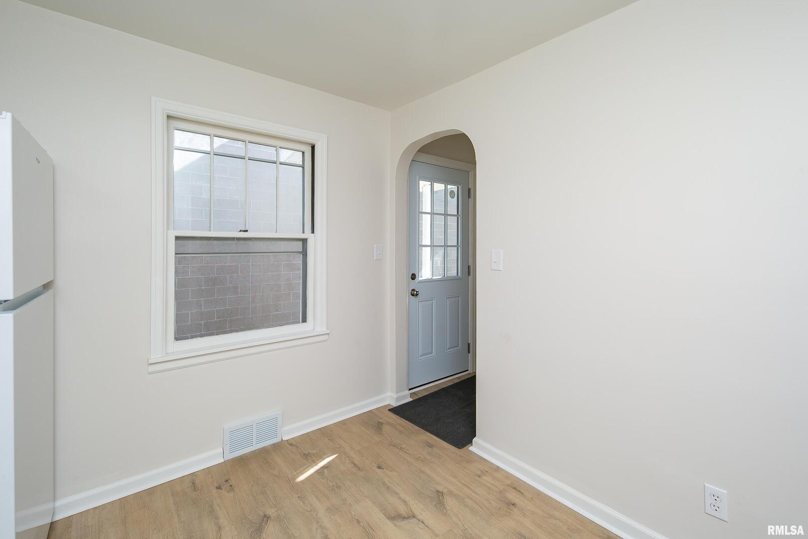 5431 3rd Avenue Moline, IL 61265 - Photo 6 of 29 an empty room with windows and closet