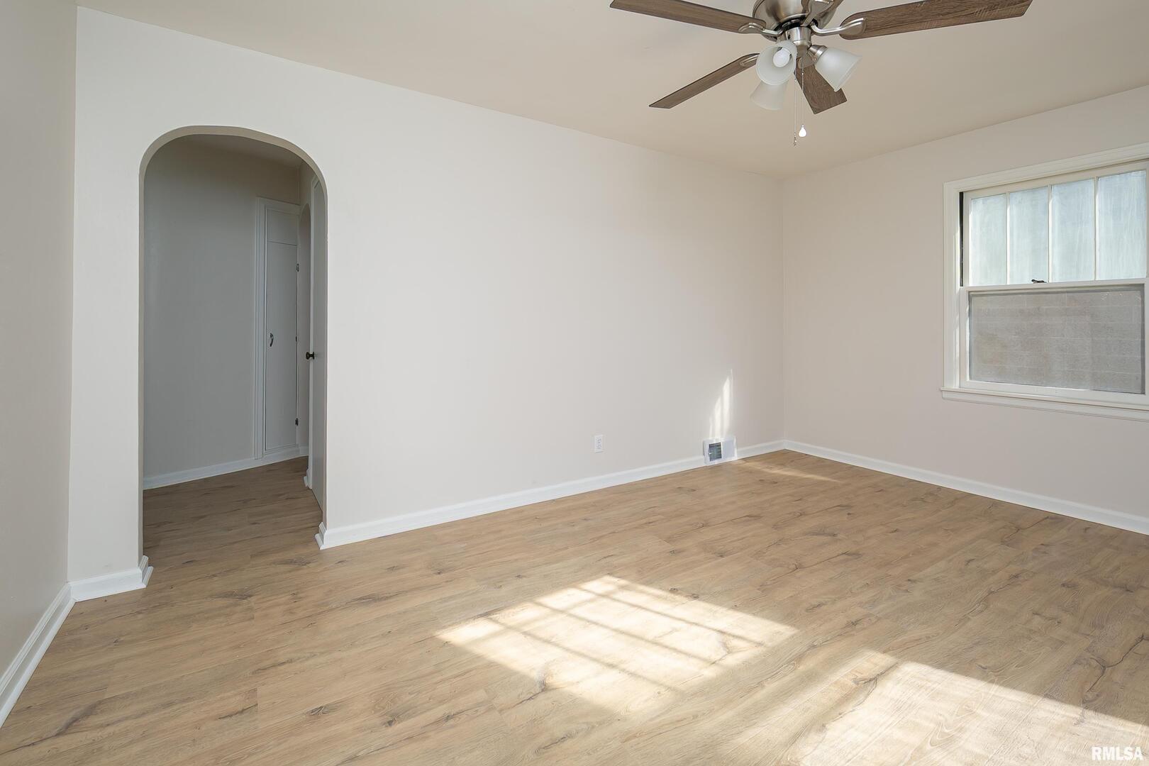 5431 3rd Avenue Moline, IL 61265 - Photo 7 of 29 an empty room with fan and windows