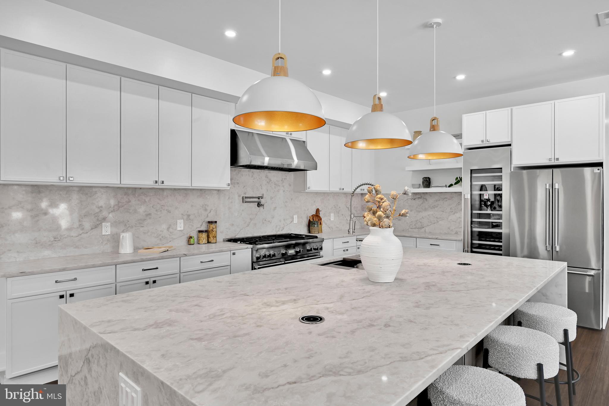 780 Hobbs Road Wayne, PA 19087 - Photo 17 of 94 a kitchen with stainless steel appliances granite countertop a sink a stove a oven a counter top space and cabinets