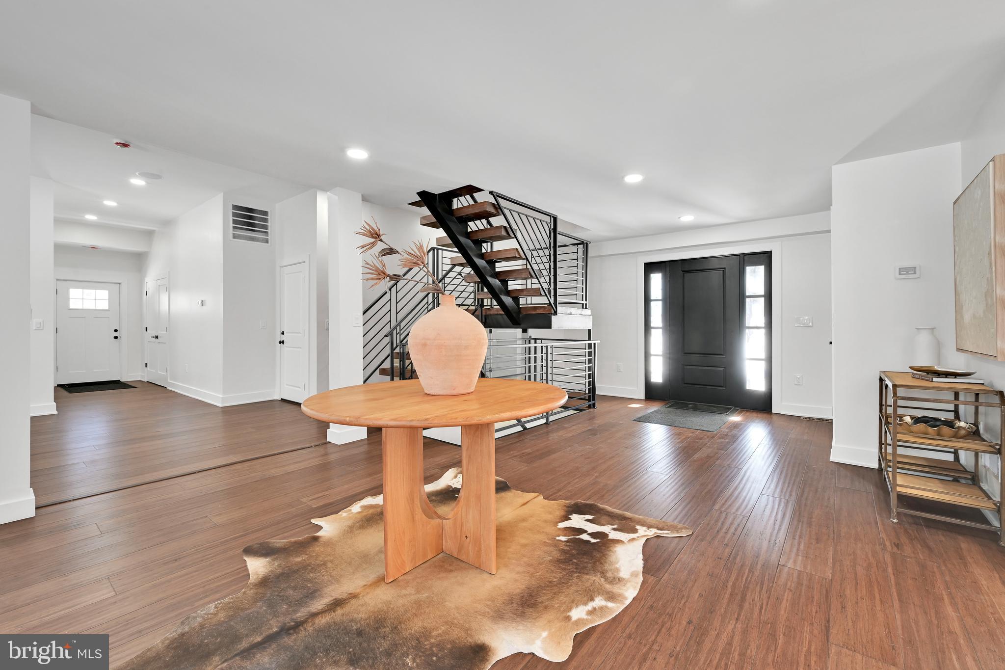 780 Hobbs Road Wayne, PA 19087 - Photo 29 of 94 a view of a room with wooden floor table and chairs