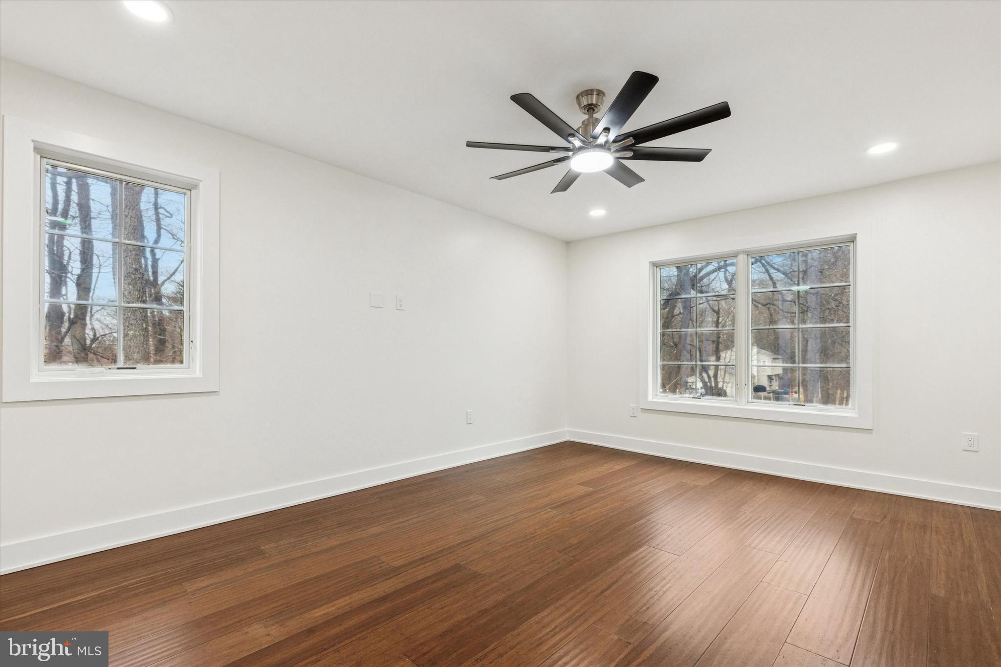 780 Hobbs Road Wayne, PA 19087 - Photo 53 of 94 a view of an empty room with wooden floor and a window