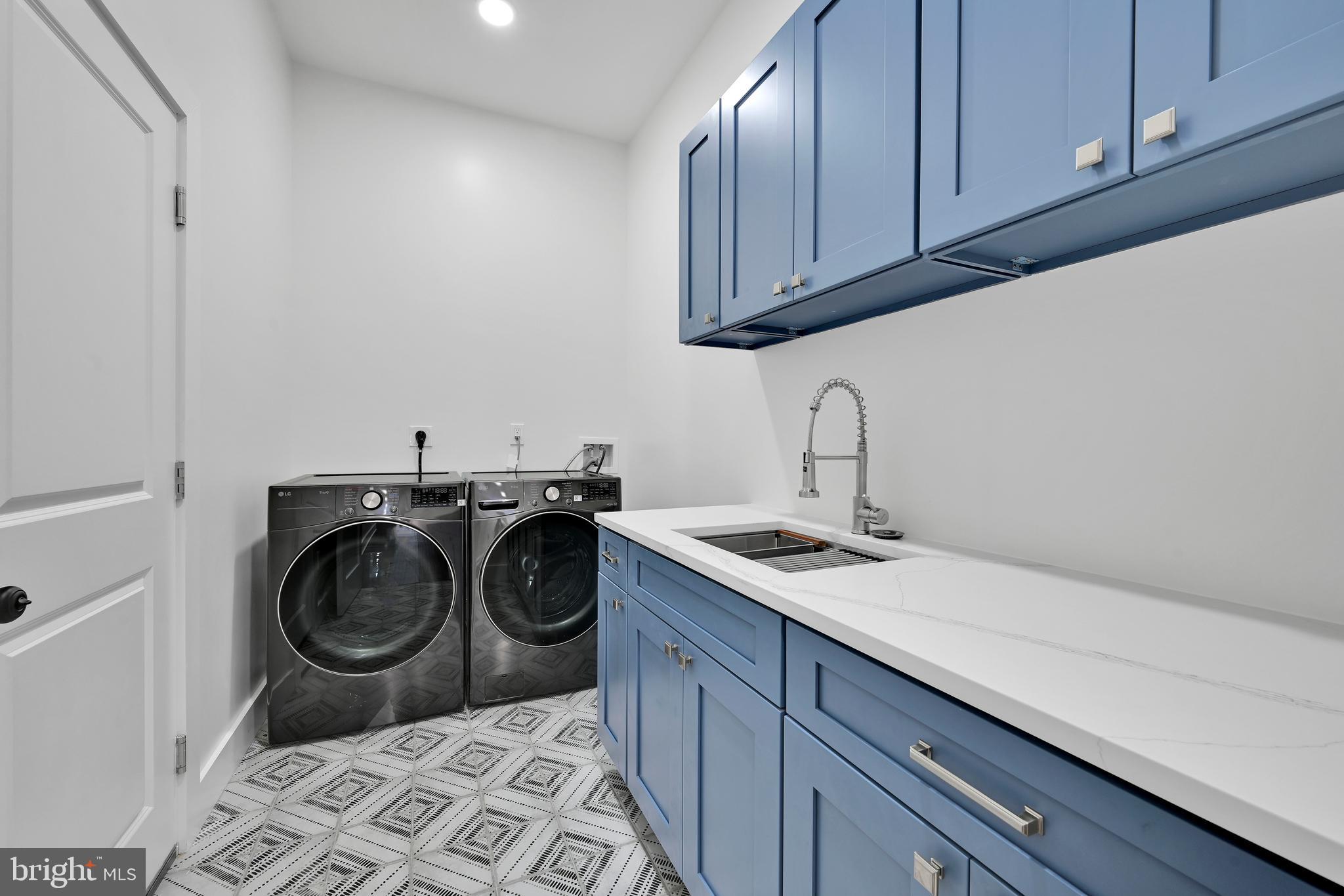 780 Hobbs Road Wayne, PA 19087 - Photo 60 of 94 a utility room with sink dryer and washer