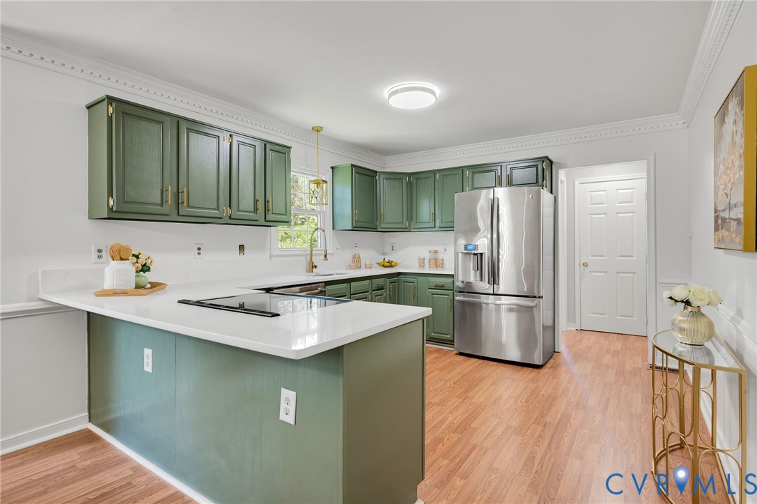 10110 Holly Road Mechanicsville, VA 23116 - Photo 13 of 26 Kitchen featuring olive-green cabinetry with gold-