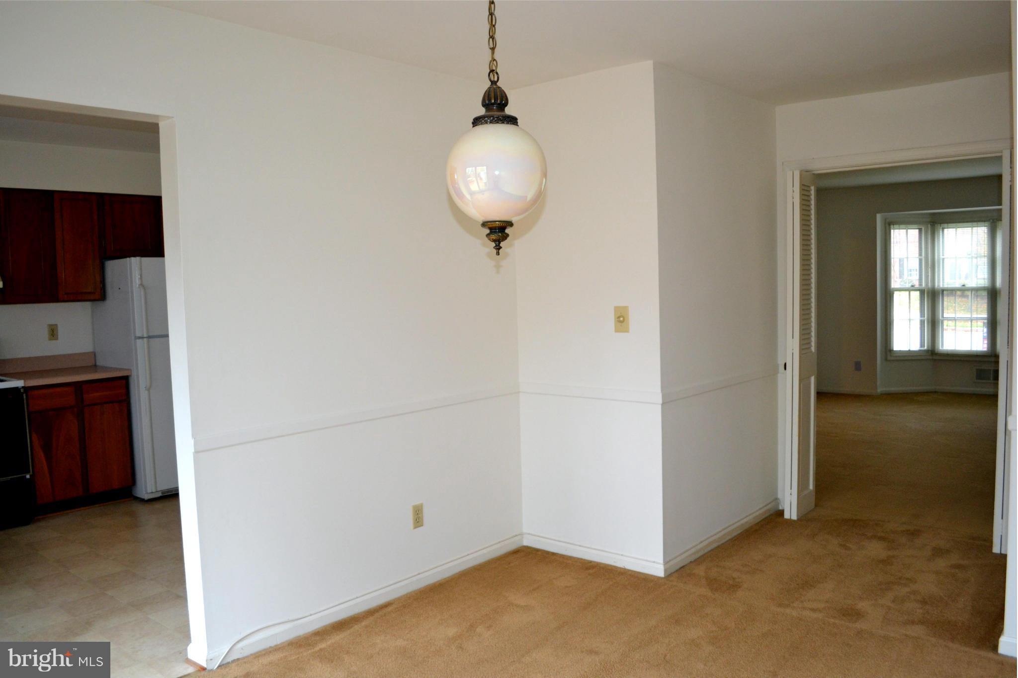 8256 Carrleigh Parkway Springfield, VA 22152 - Photo 12 of 28 a view of a livingroom with wooden floor