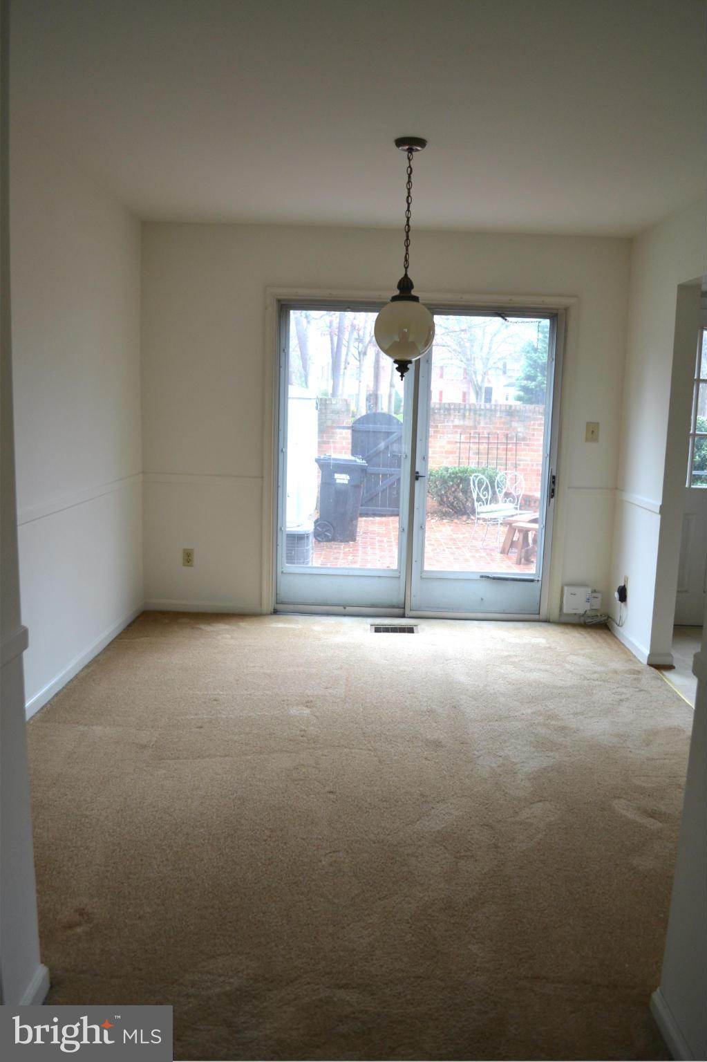 8256 Carrleigh Parkway Springfield, VA 22152 - Photo 13 of 28 a view of an empty room with a window