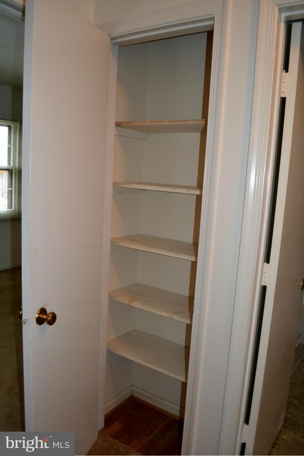 8256 Carrleigh Parkway Springfield, VA 22152 - Photo 18 of 28 a view of walk in closet