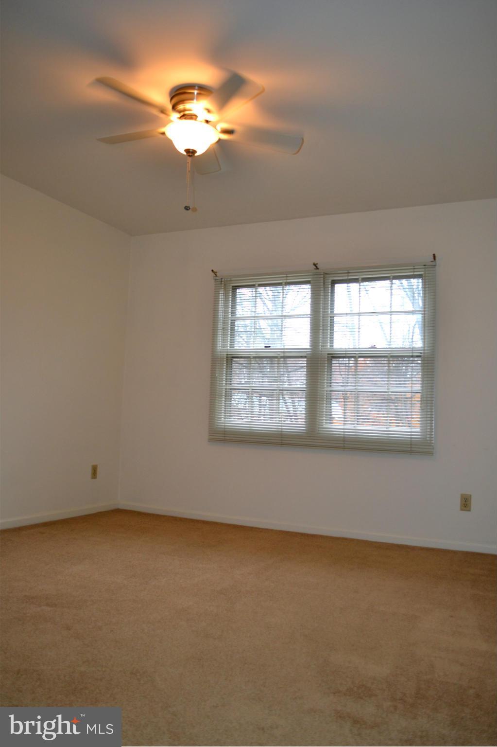 8256 Carrleigh Parkway Springfield, VA 22152 - Photo 21 of 28 an empty room with a window