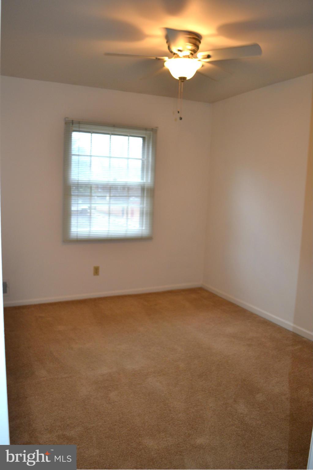 8256 Carrleigh Parkway Springfield, VA 22152 - Photo 23 of 28 an empty room with a window